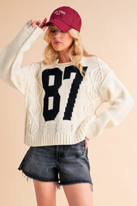 Aemi+Co Contrast Number Cable Knit Drop Shoulder Sweater