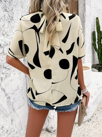 Tied Printed Mock Neck Half Sleeve Blouse