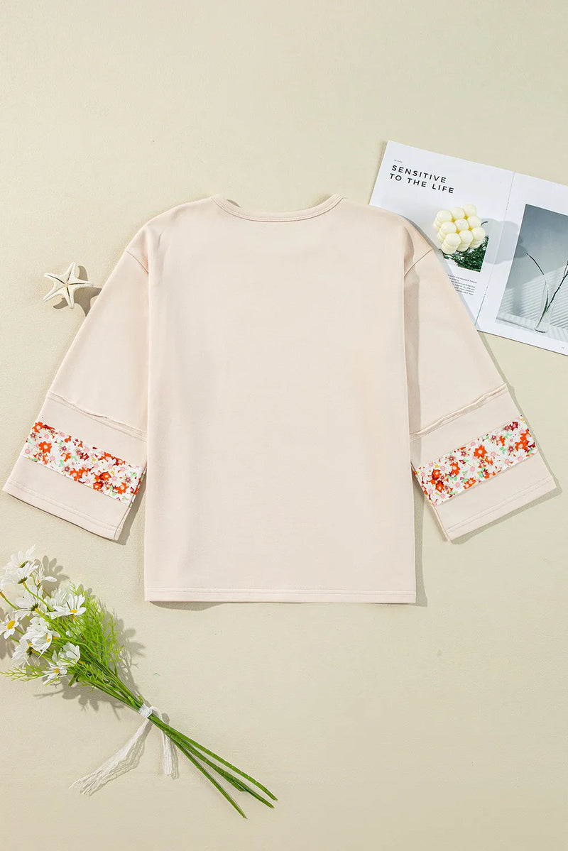 Exposed Seam Slit Floral Round Neck Blouse